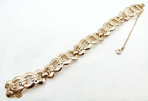 Bracelets - Monet Gold Tone Linked Flowers Bracelet