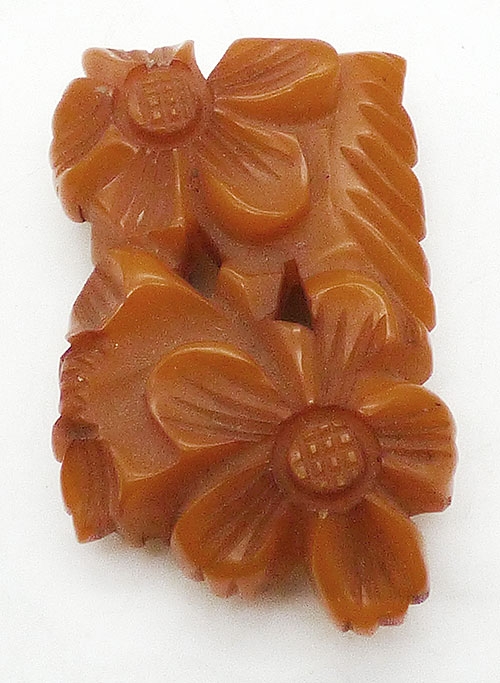 Bakelite, Celluloid, Galalith - Carved Caramel Bakelite Flowers Dress Clip