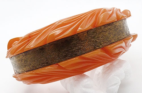 Bakelite, Celluloid, Galalith - Carved Pumpkin Bakelite and Brass Bracelet