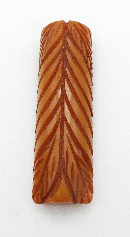Bakelite, Celluloid, Galalith - Carved Butrterscotch Bakelite Dress Clip