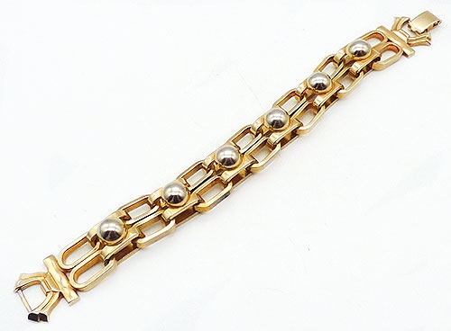Trend Spring Summer 2023: Sculptural Wire Jewelry - Gold Tone Bead Geometric Link Bracelet