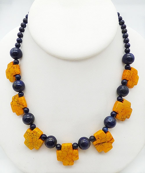 Trend Spring 2022: Saturated Color Jewelry - Yellow Swiss Cross Navy Stone Bead Necklace